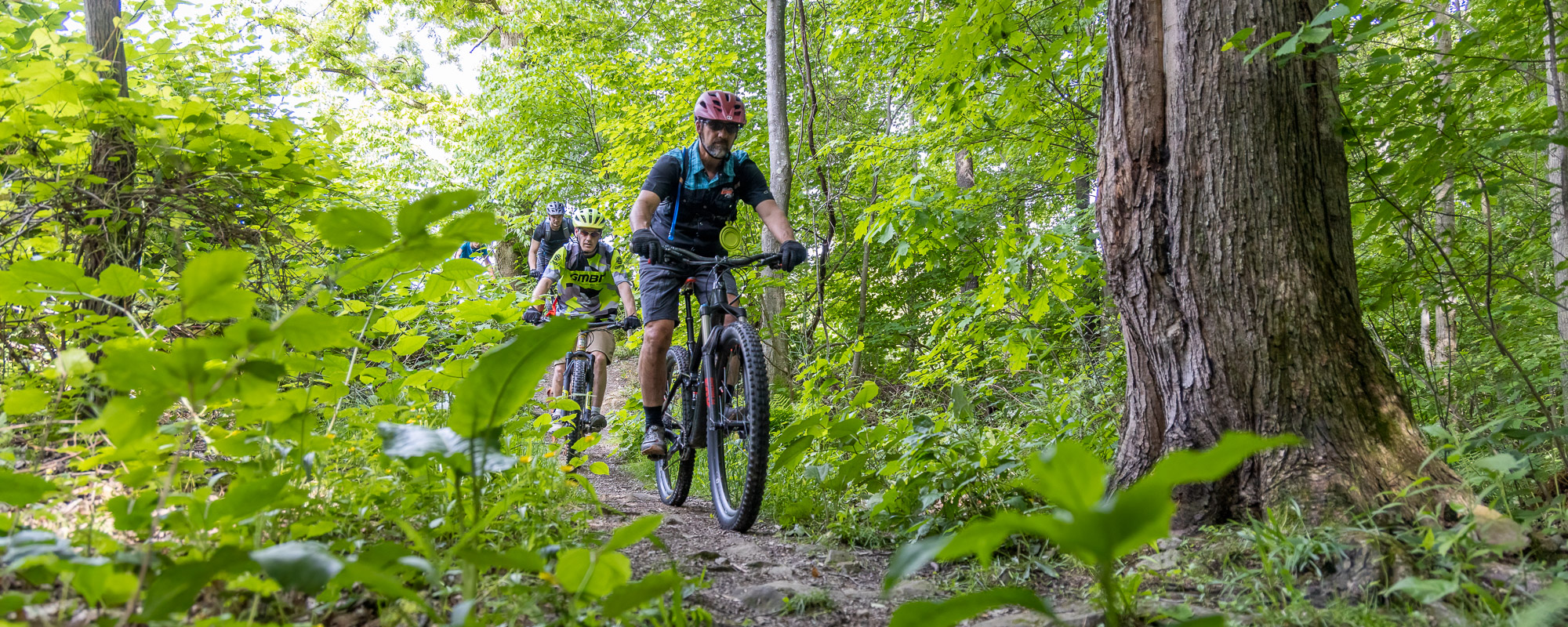 Mountain bikers ride with LHORBA on a Tuesday Night Ride at Highland Park